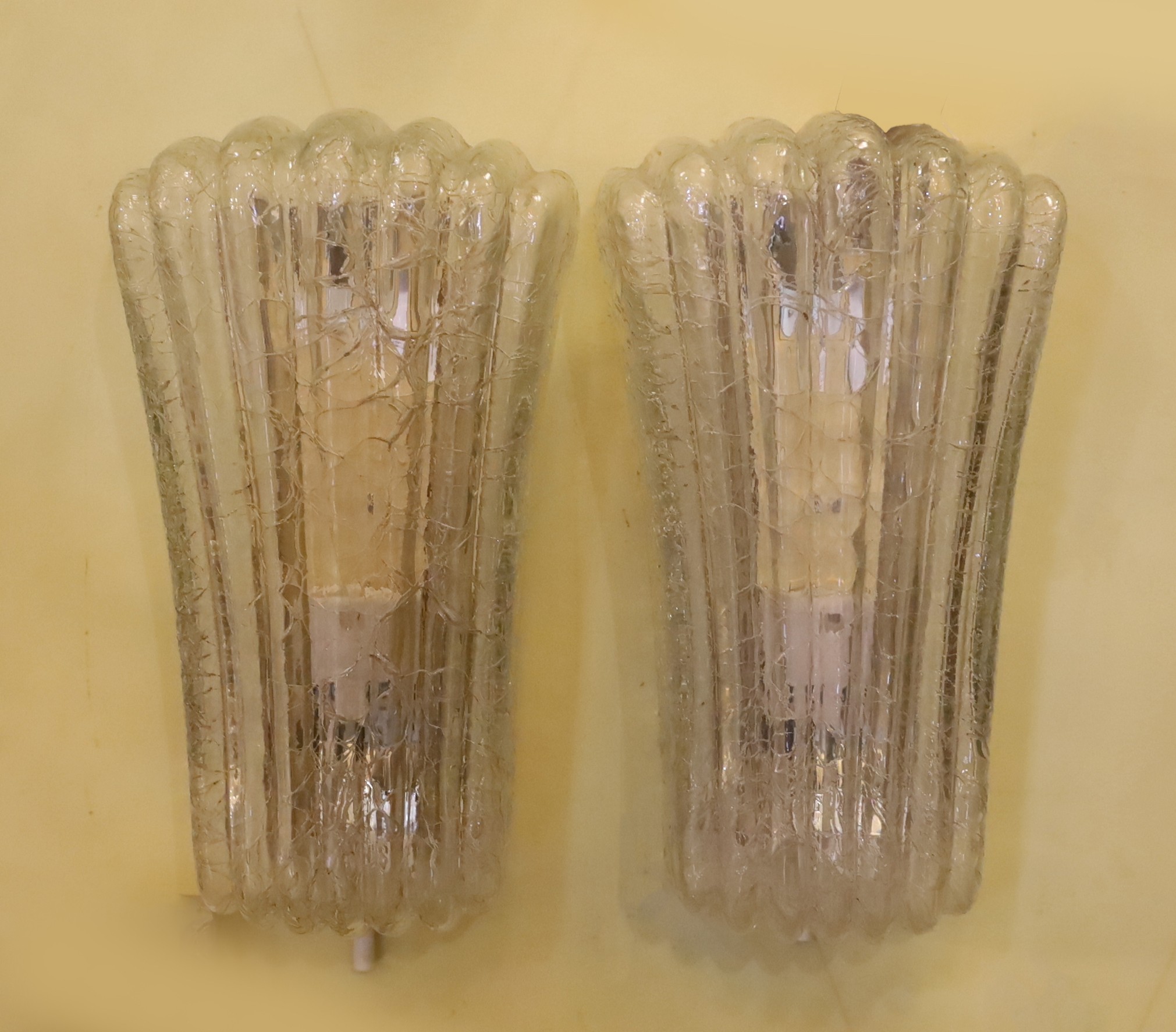 A pair of 1960s German fluted crackle glass wall lights, height 27cm. width 15cm